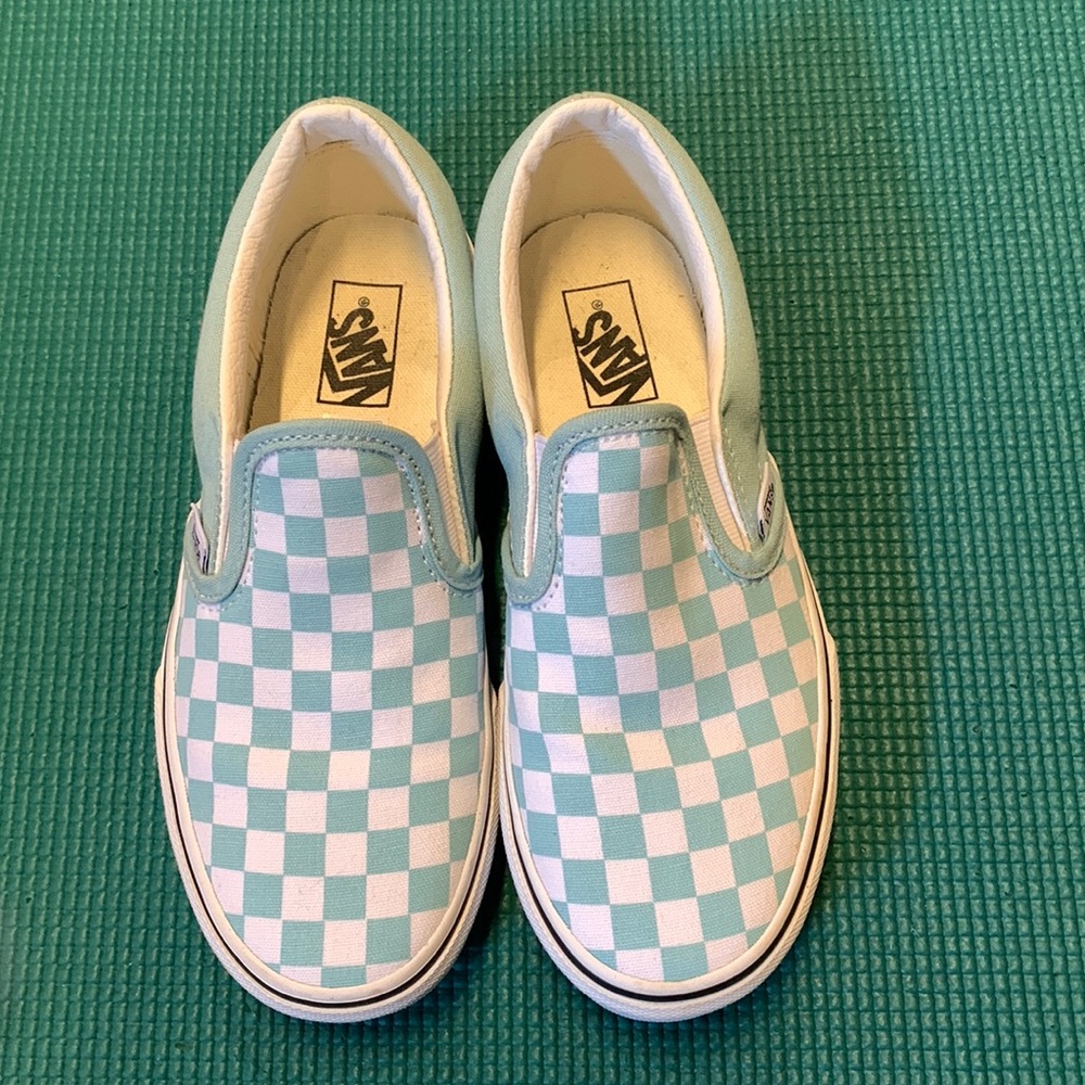 Kid’s green-checkered Vans slip on sneakers